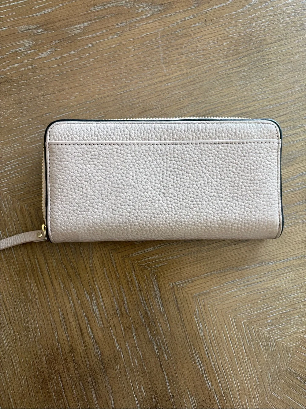 kate spade Blush Pebbled Leather Zip Wallet with Black Tassel